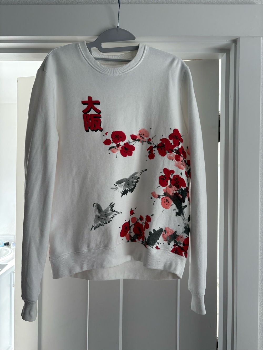 Blind Rooster White Floral & Bird Graphic Sweatshirt with Red Accents